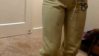 Slow and seductive black beauty in clothed amateur video