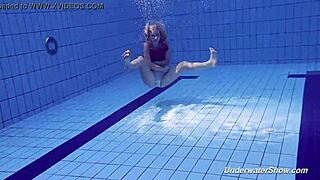 Proklova strips her bikini and swims in the pool