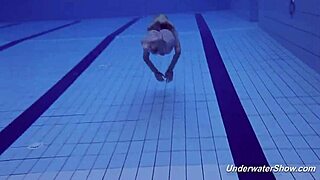 Proklova strips her bikini and swims in the pool