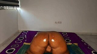 Close up and personal look at an oiled up femdom anal scene
