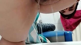 Girlfriend takes a piss directly on her boyfriend’s cock