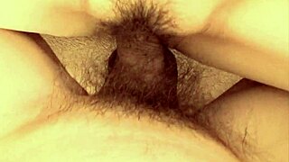 An Asian woman is enjoying intense sex and great pleasure