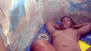 Fucking a black girl with massive breasts in a private setting