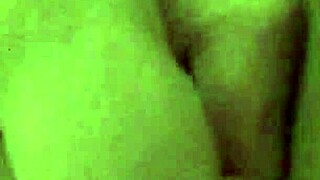 Pierced pussy gets pounded in crotchless panties with vibrator. She moans loud until orgasm hits.