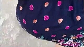 following a mature woman in skirt and thong on the street