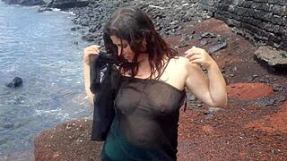 curvy brunette flashes big tits pussy on beach before sexy photoshoot