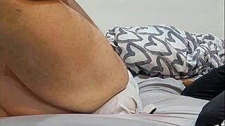 in bed she tries pegging me with huge strapon i cum quick her perfect body overwhelms