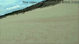 Guy dumps huge milk load all over nude beach babe