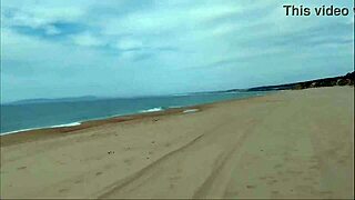 Guy dumps huge milk load all over nude beach babe