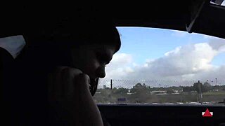 sexy brunette shifts stick with bare feet driving car publicly outdoors