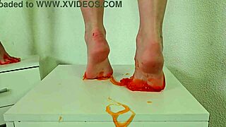 feet week alice klay playing with orange slime on toes