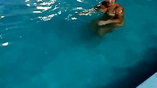 redhead enjoys pool day naked
