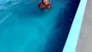 redhead enjoys pool day naked