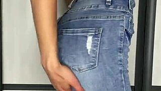 Stunning Girl In Tight Jeans Fingers Pussy With Sweet Moans