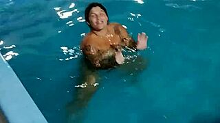 redhead enjoys pool day naked