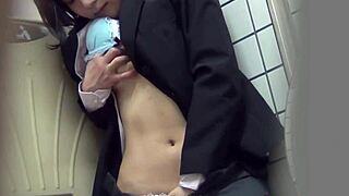 asian teen rubs her pussy outside