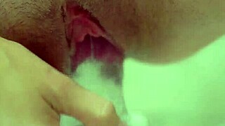 Natural busty redhead closeup masturbation with clear dildo