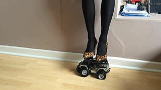 toy car gets crushed under high heels in garage