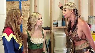 Cosplaying lesbians take of the new blonde by starting a threesome filled with eating ass and scissoring