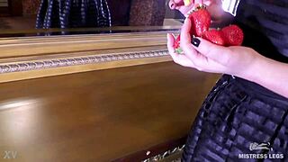 Strawberry squeezed by feet