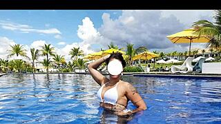 Curvy Brazilian relaxes poolside in bikini