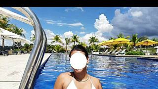 Curvy Brazilian relaxes poolside in bikini