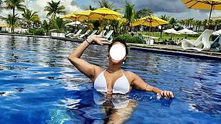 Curvy Brazilian relaxes poolside in bikini