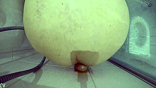 Big slave endures rough bloody dildo fuck in shower