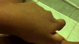 Yamileth pleasures herself in the bathroom