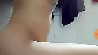 Teen girl explores self-pleasure in a private moment