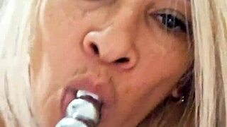 Milf plays with dildo in pussy