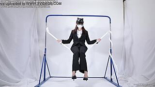 A woman intensely masturbates using a tight rope for pleasure