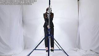 A woman intensely masturbates using a tight rope for pleasure