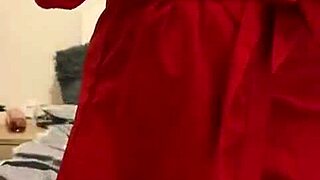 Brunette in red lingerie self-pleasures alone