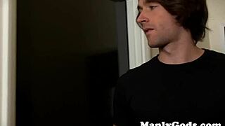 Gay athletic hunk couple engages in anal assfucking and mutual masturbation close up with tattoos