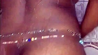 black thick ebony babe fucks and dances while bathing in the shower.