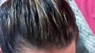 This blonde girlfriend is eating cum after a blowjob.