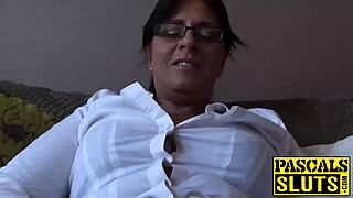 Attractive busty MILF AMBER MASTURBATES on the SOFA!