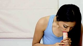 Watch this sexy 18+ Asian brunette put a condom in her mouth during a handjob. 😘🍆