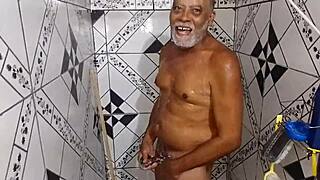 gugu dancing with his hard dick in the bathroom