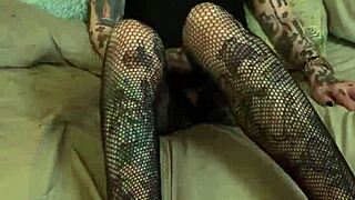 She encourages him to jerk off with glasses and tattoo.