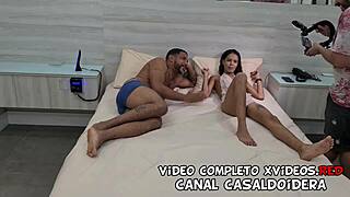 Young Karolzinha enjoys a threesome in the hotel room.