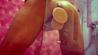 Belinda Selin in the shower impales her pussy on a big dildo for intense orgasm