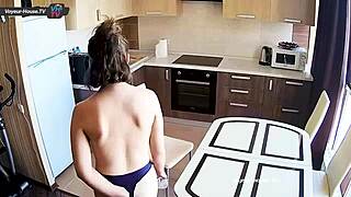 Big Tits Beauty Cleans Kitchen Voyeur!