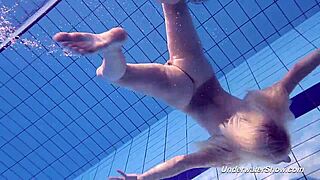 hey, proklova strips off bikini and swims nude underwater