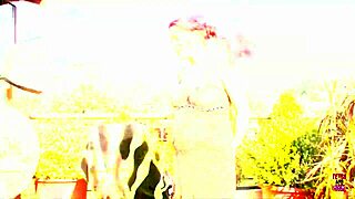 On a sunny roof, pregnant redhead banged with cum on belly