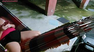 Madrasta unaware of exposed shorts while relaxing in hammock. I can't resist getting hard over her curves.