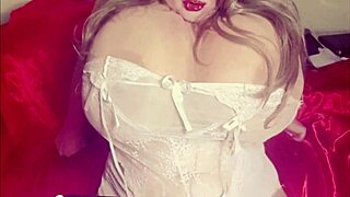 white lingerie girl shows boobs sucks toy milky