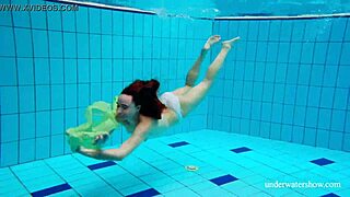 Teen Nina Mohnatka Flashes Her Hairy Tight Pussy on Beach