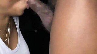 sexy girl in lingerie performs close-up oral on big black cock